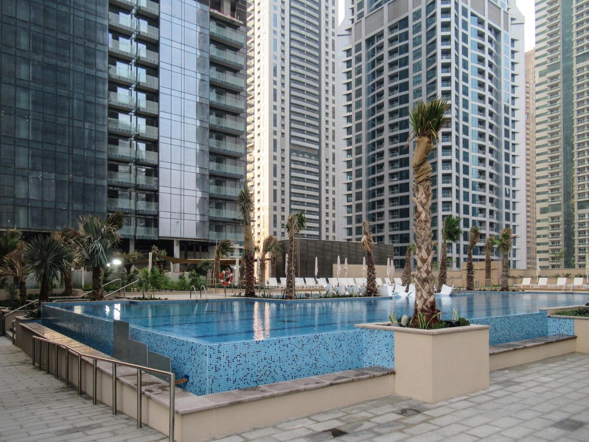 Marina Gate Cozy 1br, Pool, Gym, & Direct Marina Walk Access Appartement *