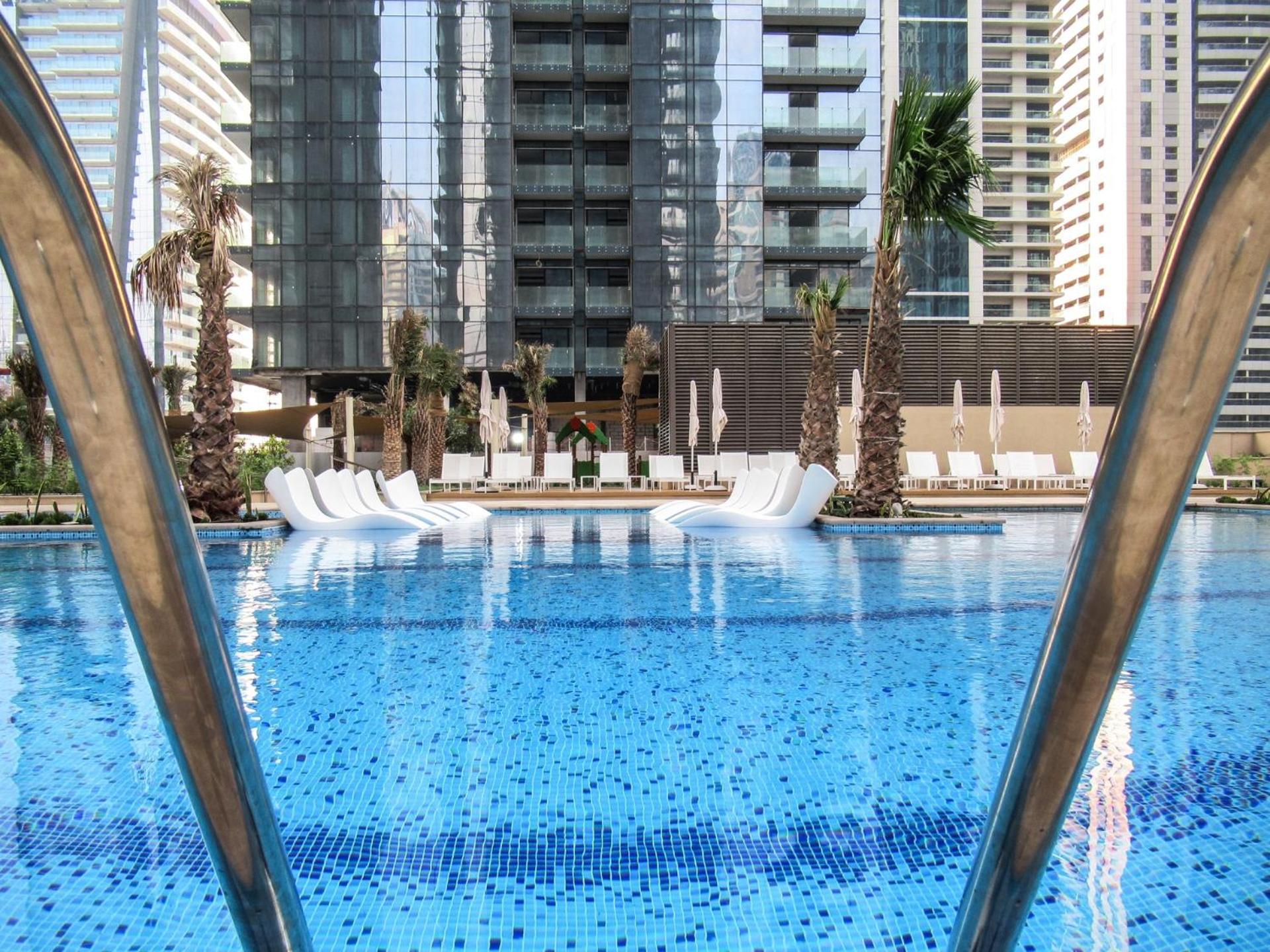 Marina Gate Cozy 1br, Pool, Gym, & Direct Marina Walk Access Appartement *